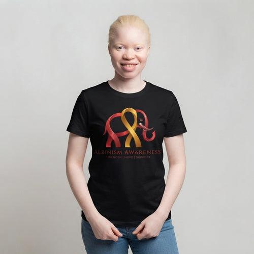 Woman wearing Albinism Awareness short sleeve tee with elephant and ribbon graphic in red and gold on black